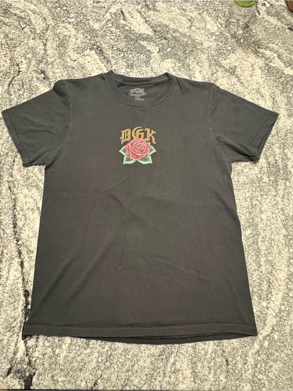 GK Black Short-Sleeve Tee with Gold Logo and Red Rose